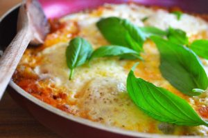 skillet eggs with tomatoes, parmigiano-reggiano & basil | rusticplate.com